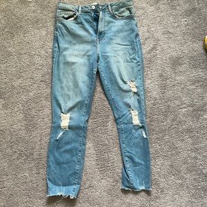 blue jeans w a heart symbol on the corner